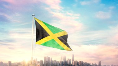 Jamaika ulusal bayrağı gökyüzünde güzel bir rüzgarla dalgalanıyor.