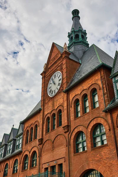 Image of Liberty State Park ferry station building exterior brick with clock