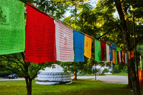 Image of Rope covered in colorful Tibetan Mongolian Buddhist prayer flags