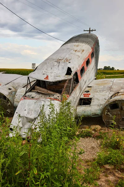 Image of Vertical view of airplane crashed and abandoned in fields