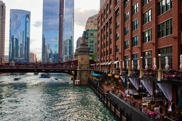 Image of Patio dining on Chicago canals next to skyscrapers