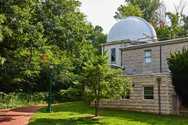 Image of Campus Observatory building in forest of Indiana University