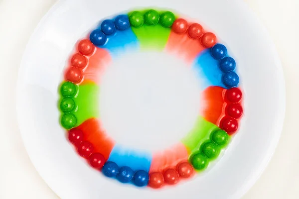 Zdjęcie Skittles Candy Ring Krwawiące Kolory Tła — Zdjęcie stockowe