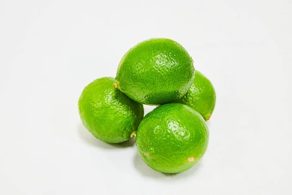 Image Four Fresh Lime Green Limes White Background — Stock Photo, Image