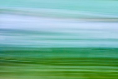 Mavi ve yeşil fırça darbeleriyle rüzgar ve çimlerin hızlı arkaplan varlık görüntüsü