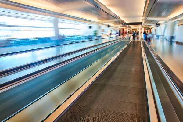 Image Artistic Blur Airport Focus Moving Walkway Blue Creamy Yellow Stock Image