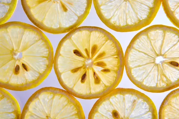 Зображення Макро Декількох Цитрусових Шматочків Лимона Білому Тлі — стокове фото