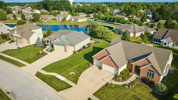 stock image Image of Aerial of suburban neighborhood with pod and clean lawns and driveways