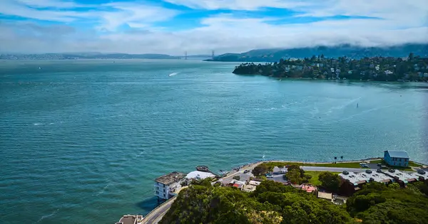 Image of Aerial Tiburon waterfront properties overlooking San Francisco Bay with Golden Gate Bridge
