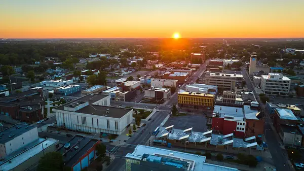 stock image Image of Golden sun rising at dawn over Muncie IN downtown buildings and courthouse, sunrise aerial