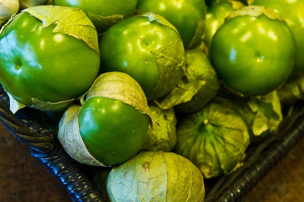 Fresh Tomatillos Staple Mexican Cuisine Sit Woven Basket Vibrant Green — Stock Photo, Image
