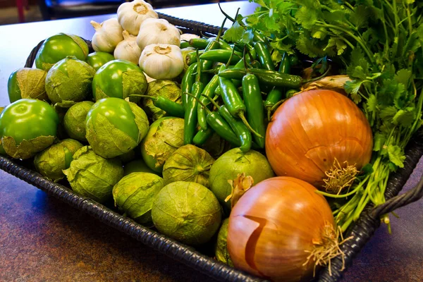 Fresh Vibrant Vegetables Tomatillos Garlic Bulbs Onions Cilantro Serrano Peppers — Stock Photo, Image