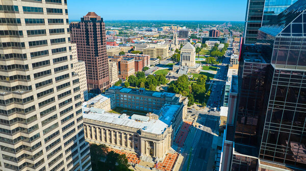 Sunny Day Over Indianapolis, Aerial View of Modern High-Rises and Historical Dome Building
