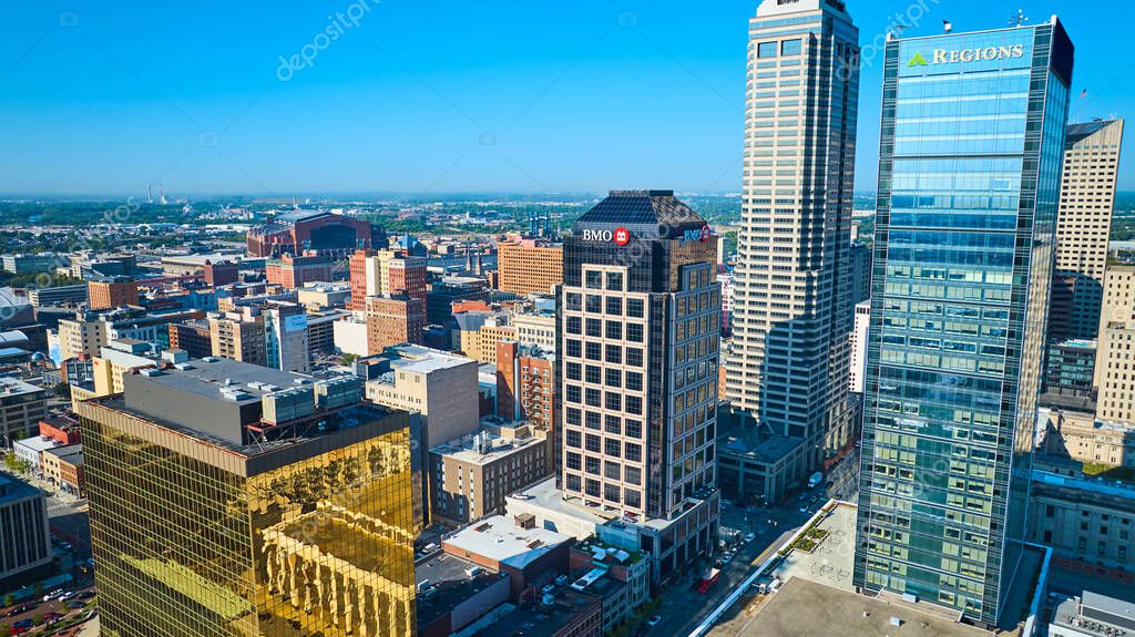 Aerial View of Modern Indianapolis Downtown, 2023 - Sunlit Skyscrapers in Commercial District Captured by DJI Mavic 3 Drone