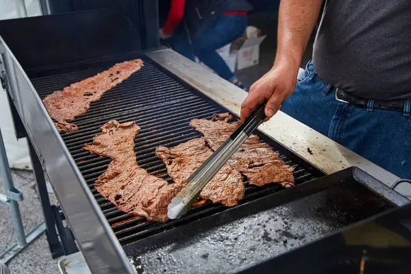 Casual Cookout Scene Showing Person Skillfully Grilling Large Pieces Meat — Stock Photo, Image