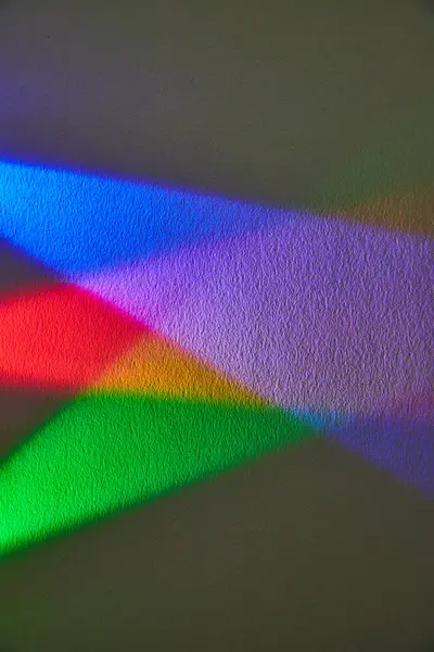 stock image Vibrant display of refracted rainbow light against a textured surface, symbolizing unity and diversity, captured in Fort Wayne, Indiana.