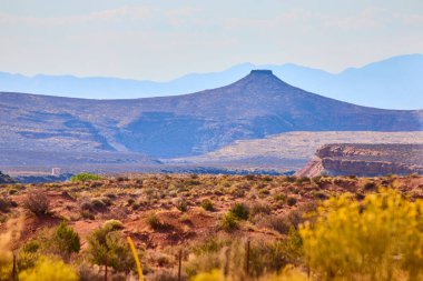 Bask in the serene beauty of Kolob Canyon in Zion National Park, Utah. This stunning mesa and rugged desert landscape evoke solitude and the timeless grandeur of untouched nature. clipart