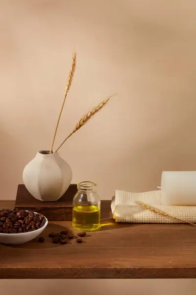 Product and promotion concept for advertising organic product with ingredient from coffee. On the brown background, coffee beans on bowl decorated with vase, candle and towel Front view
