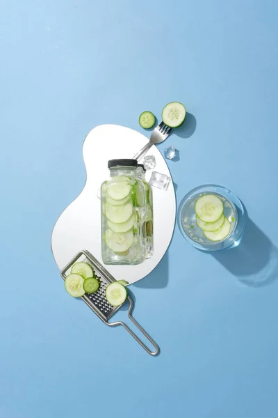Top View Unbranded Water Bottle Placed Mirror Glass Filled Cucumber — Stock Photo, Image