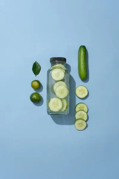 Glass Bottle Label Decorated Kumquats Few Slices Cucumber Cucumber Has — Stock Photo, Image