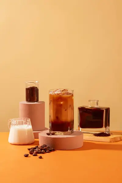 Milk coffee, black coffee, coffee powder and milk are stored in glasses. Coffee can reduce the risk of type two diabetes. Copy space for advertising.