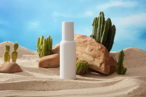 White Bottle Label Decorated Some Stones Green Cacti Beach Sand — Stock Photo, Image