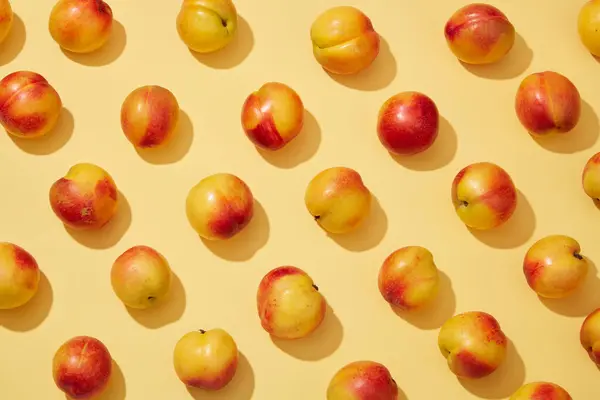 Colorful Fruit Pattern Fresh Peaches Prunus Persica Yellow Background Creative — Stock Photo, Image