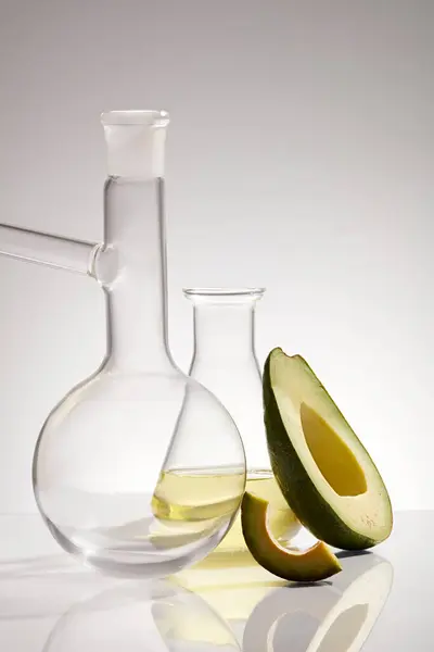 Front View Lab Glassware Containing Essential Oil Fresh Avocado Persea — Stock Photo, Image
