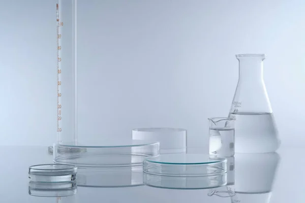Minimal Background Laboratory Glassware Containing Colorless Liquid Decorated White Background — Stock Photo, Image