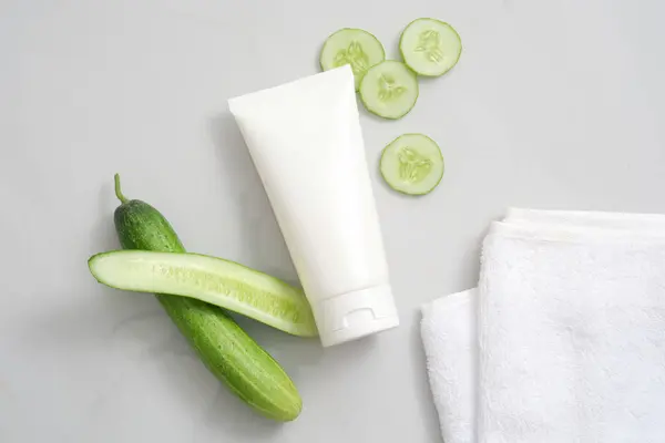 Top View White Plastic Tube Unbranded Cucumber Sliced Towel White — Stock Photo, Image