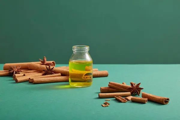 Front View Cinnamon Sticks Glass Bottle Containing Essential Oil Illicium — Stock Photo, Image