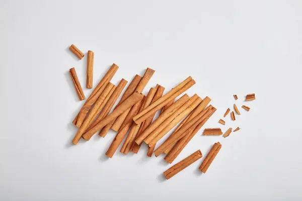Top View Cinnamon Sticks Cinnamomum Isolated White Background Scene Advertising — Stock Photo, Image