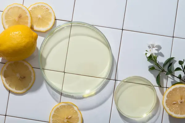 Two Glass Petri Dishes Filled Essential Oil Extracted Lemon Mosaic — Stock Photo, Image