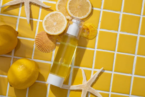 Mosaic Tiles Background Blank Label Transparent Bottle Filled Yellow Liquid — Stock Photo, Image