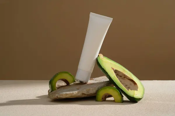 Stone White Tube Placed Arranged Avocado Slices Beige Background Cosmetic — Stock Photo, Image