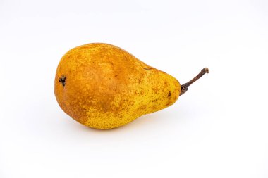 A ripe Williams Christ pear cropped against white background and photographed with focus stacking in studio