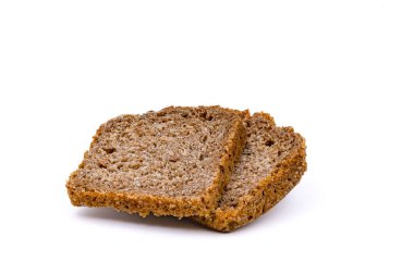 Two slices of healthy, organic bread with lots of fiber isolated against a white background as a studio shot