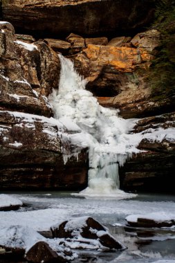 Cedar Falls Frozen in Winter, Hocking Hills State Park, Ohio clipart