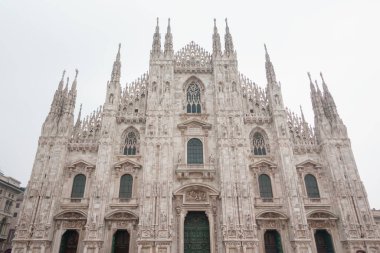 Milan, Italy - 28/12/2022: The  Milan Cathedral, Duomo di Milano, the largest Gothic cathedral in the world in Square Piazza Duomo, Italy