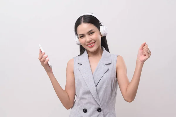 Young Woman Wearing Headphones Enjoying Music White Background — Stock Photo, Image