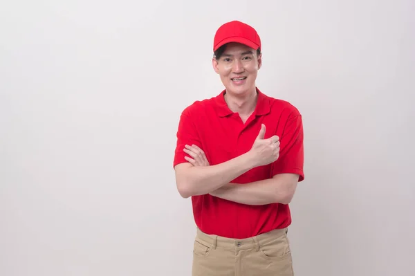 Asian Young Delivery Man Wearing Red Uniform White Background Studio — Stock Photo, Image