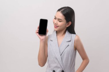 Beautiful woman using smartphone over white background, technology concept. 		