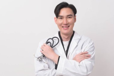 Portrait of male confident doctor over white background studio, healthcare and Medical technology concept.