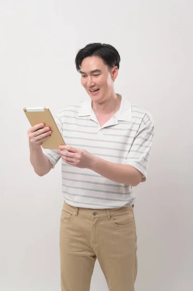 Young Asian Man Using Tablet White Background Technology Concept — Stock Fotó