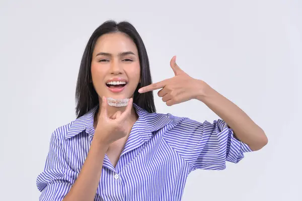 Young Smiling Woman Holding Invisalign Braces White Background Studio Dental — Φωτογραφία Αρχείου