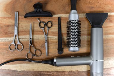 The tools of the hairdresser lie on the table. Workplace in a hairdresser