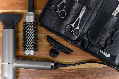 The tools of the hairdresser lie on the table. Workplace in a hairdresser