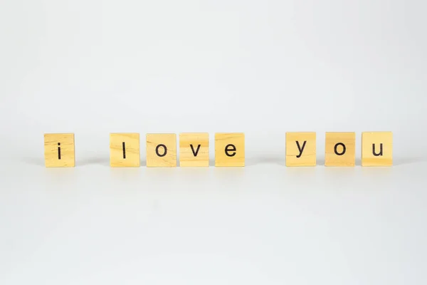 letters i love you wooden, copy space. Love concept.