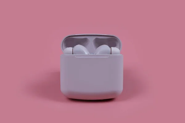Flat lay storage concept: headphones and smartphone on pastel color background. wireless headphones on a pink gray background, top view, copy space.