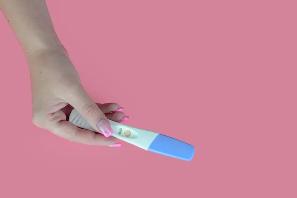 Woman Hand Holding Pregnancy Test Blue Background Copy Space Top — Stock Photo, Image